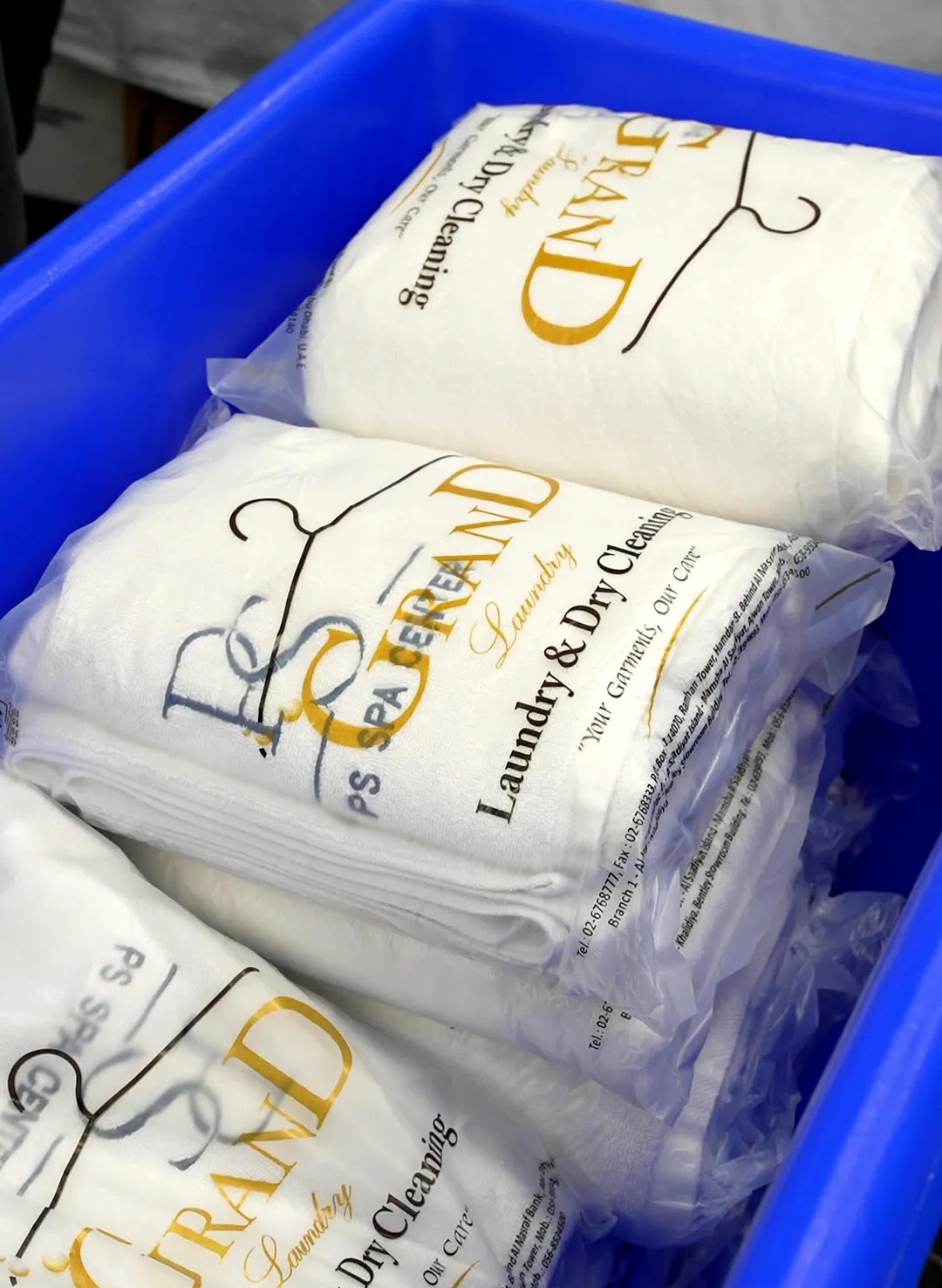 Cleaned bedding sealed in Grand Laundry packaging